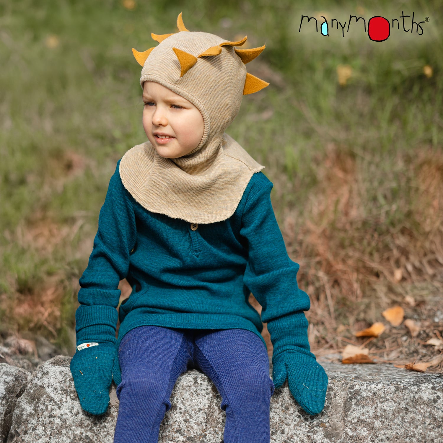 Cagoule Dino ManyMonths en laine mérinos – 2025/26