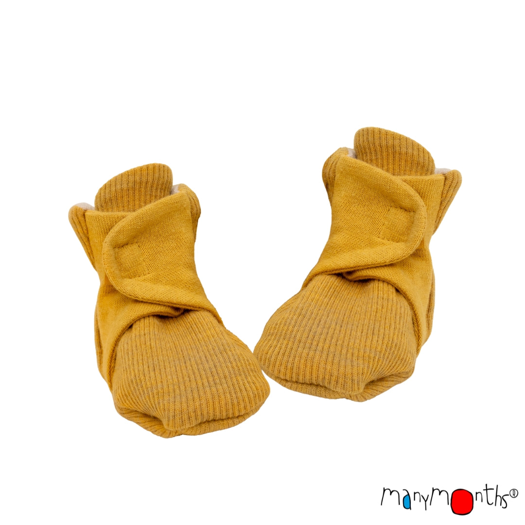 Chaussons bébé en laine mérinos ManyMonths Wrap Booties, coloris jaune Golden Star – collection 2026/2027