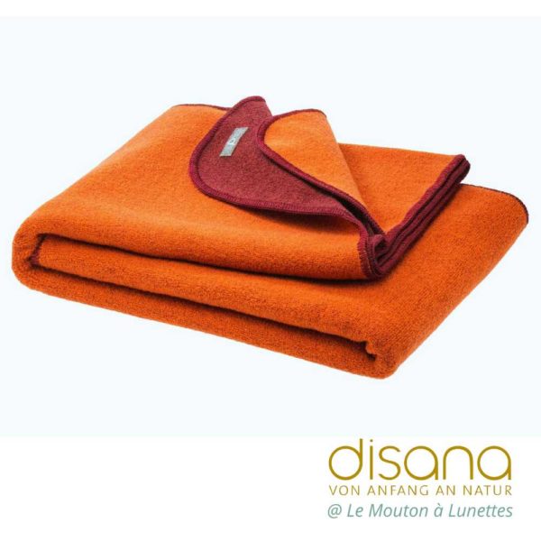 Couverture double-face Disana en laine bouillie bio orange cassis
